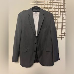 Oversized vintage charcoal grey blazer jacket with shoulder pads and pockets